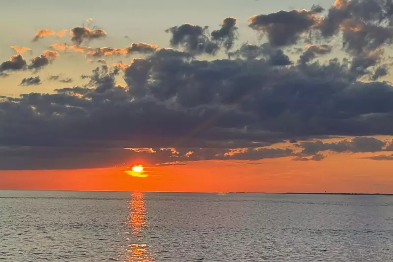 This is a common year round experience at Tee Time.  Best sunset location on the island!