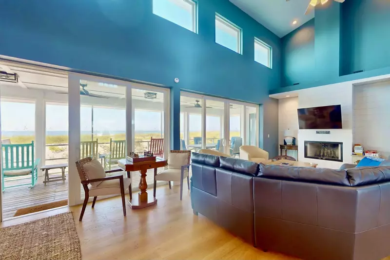 The main living area flows seamlessly with the screened porch