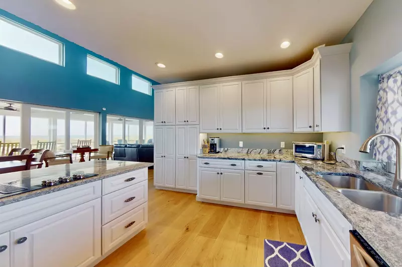 The bright kitchen has plenty of counter space to make great meals