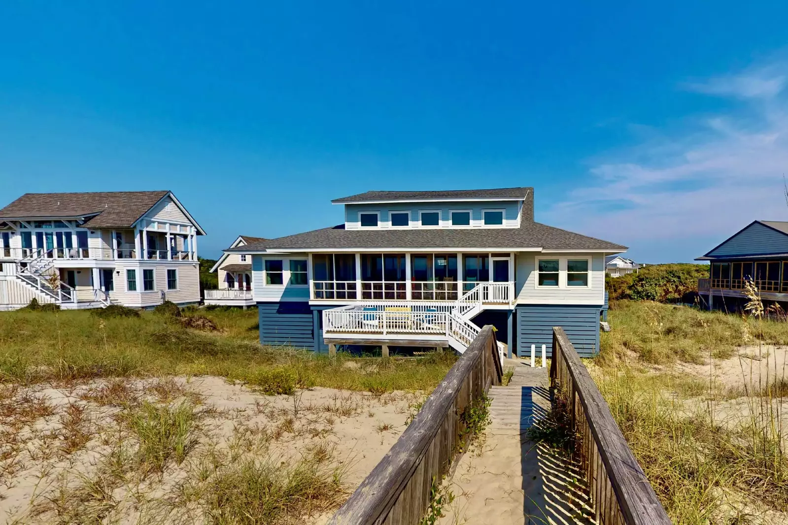 Your toes will be in the sand in no time at this lovely house
