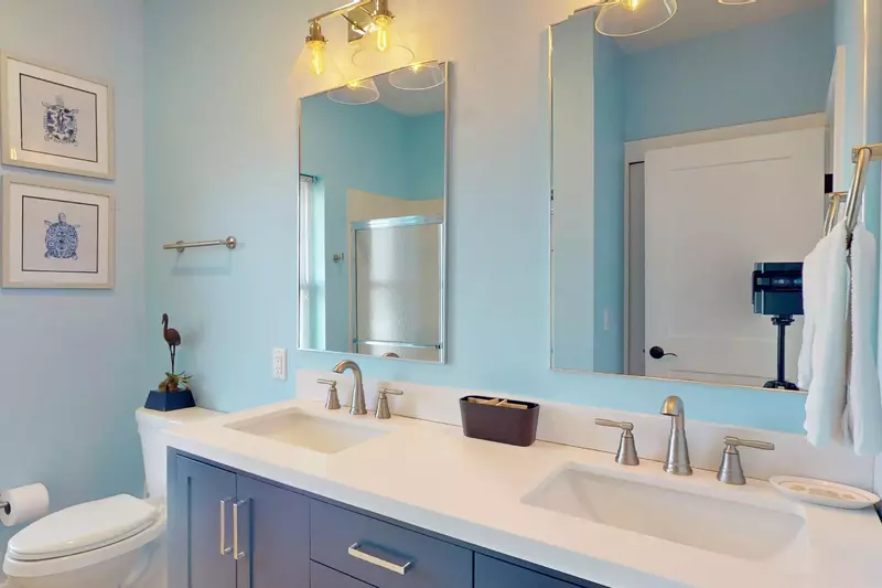 The second bedroom en-suite has a double vanity and walk-in shower