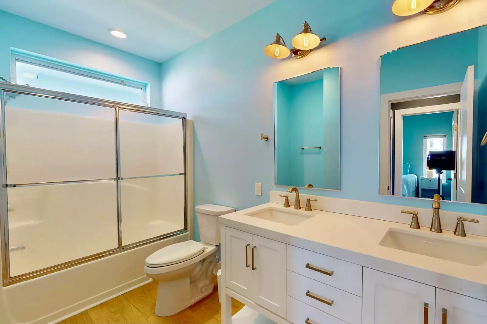 The third bedroom en-suite has a double vanity and tub/shower combo