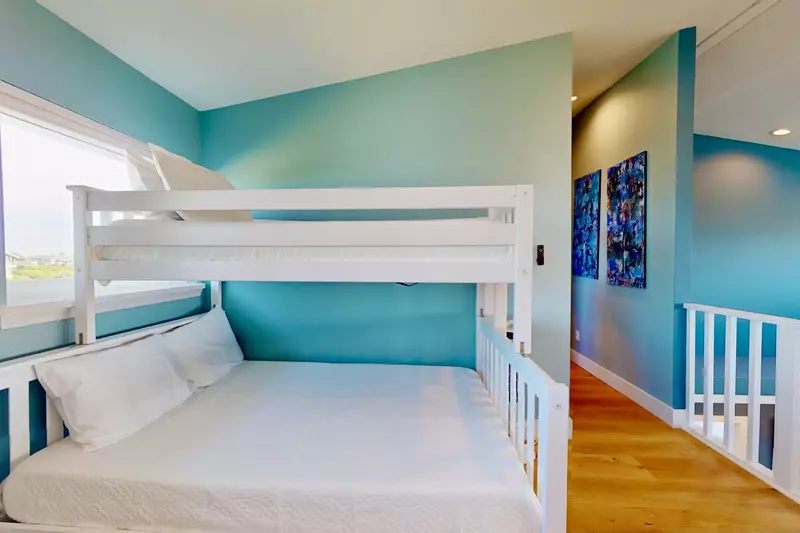 The loft area has two sets of bunk beds including this twin over full