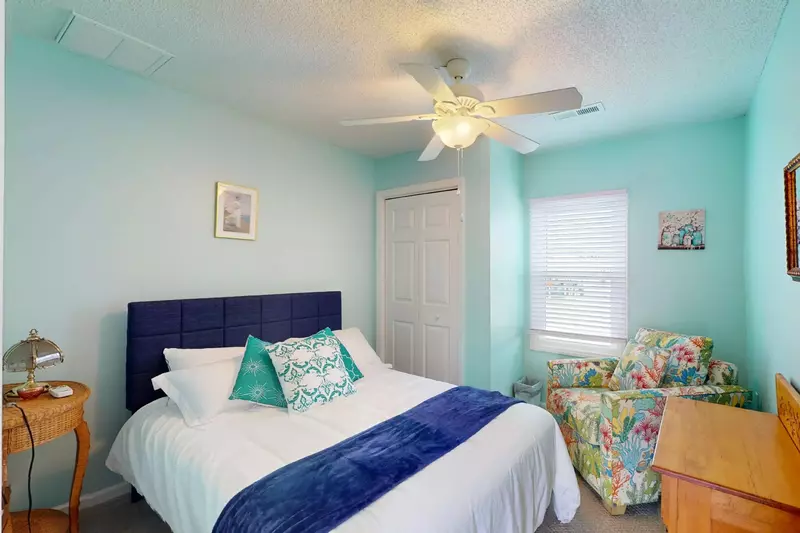 Bec's second bedroom also features a sitting area