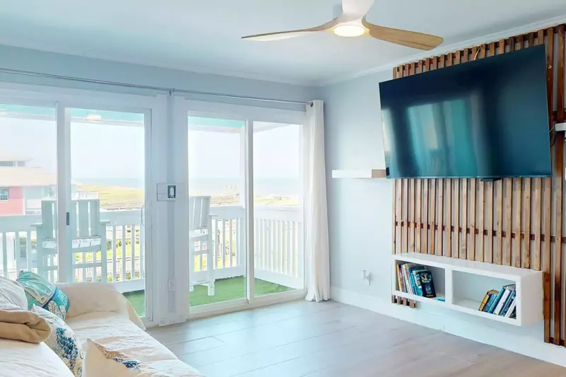 Ocean views and lots of natural light fill the living room