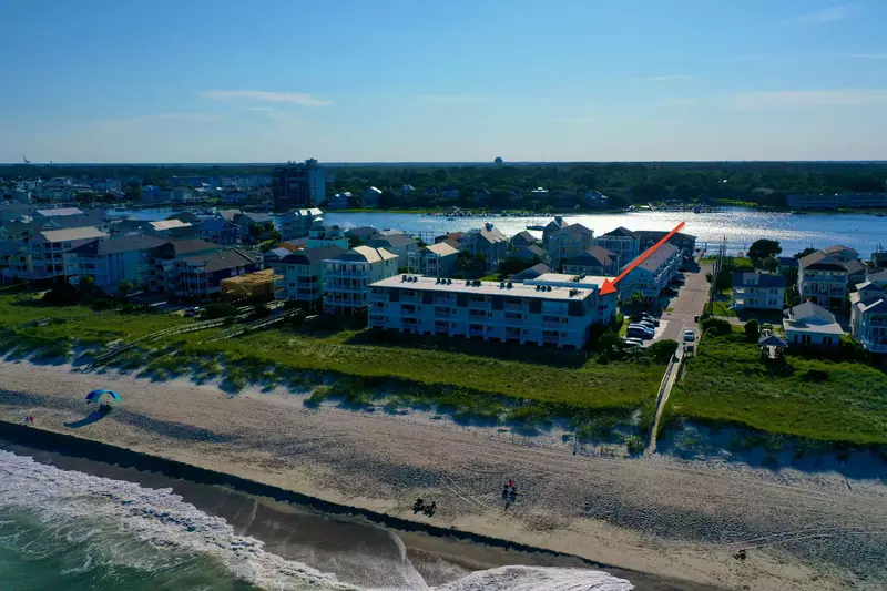 This building is oceanfront on a large stretch of sandy beach