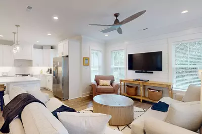 Relax in the comfy living room space with seating for the whole group