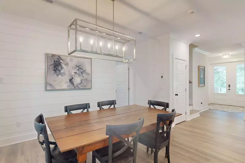 Gather for family dinners or game night at the large dining table