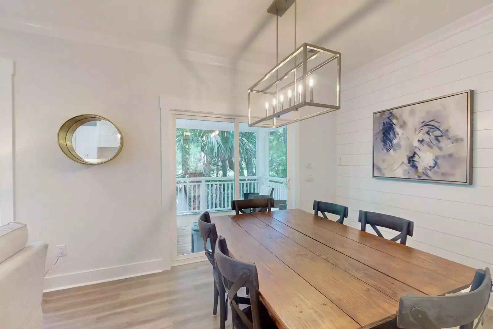 The dining area leads to a large covered deck