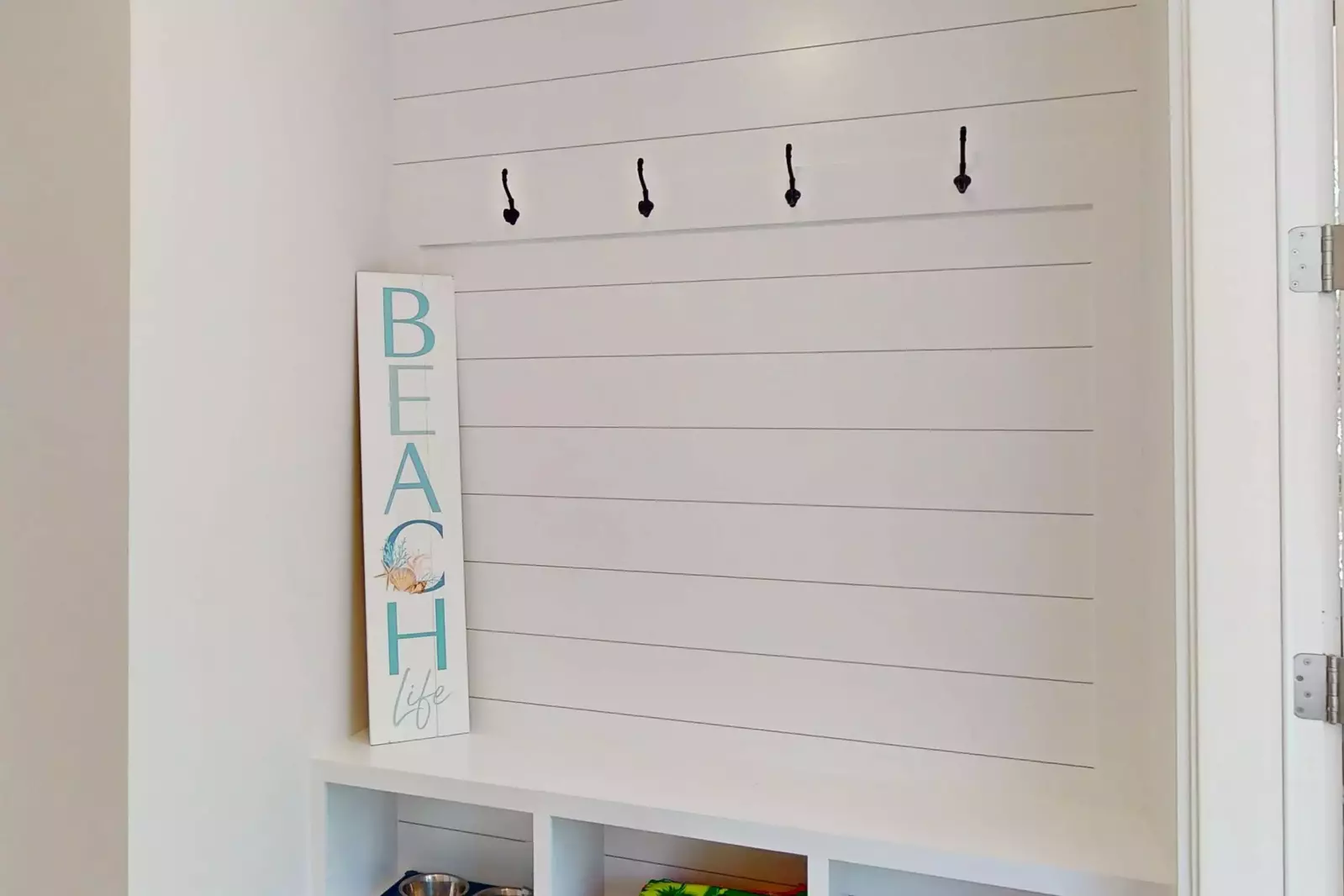 A perfect spot just inside the front door to hang towels, leashes or jackets