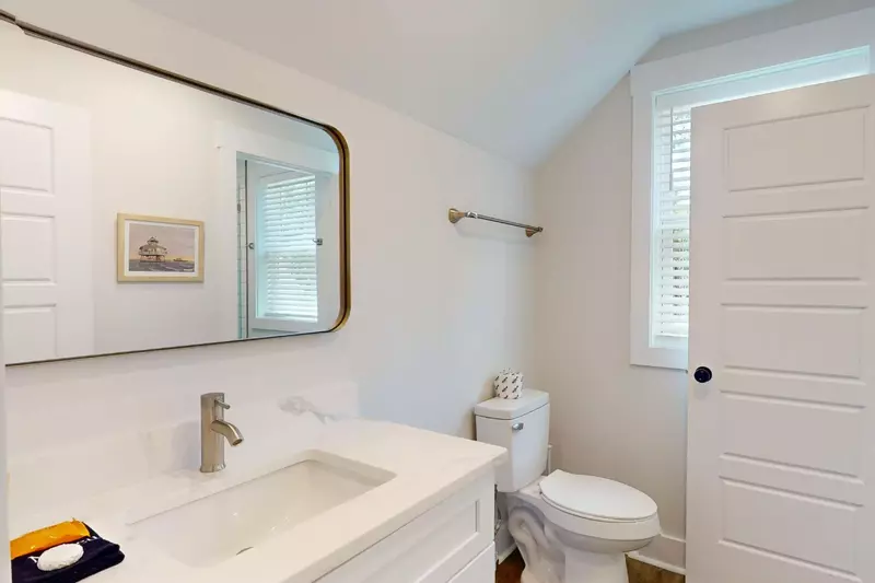 Bunk rooms half bath area that connects to the jack and jill shower