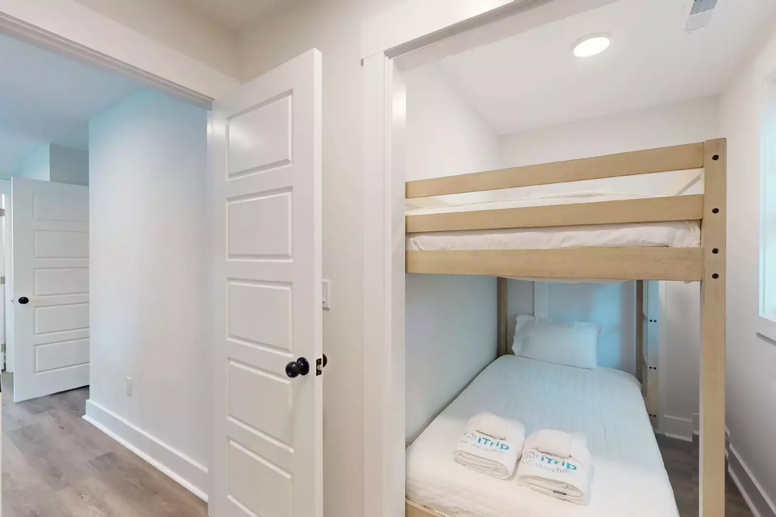 The kids will love this cozy bunk area with twin over twin bunk beds
