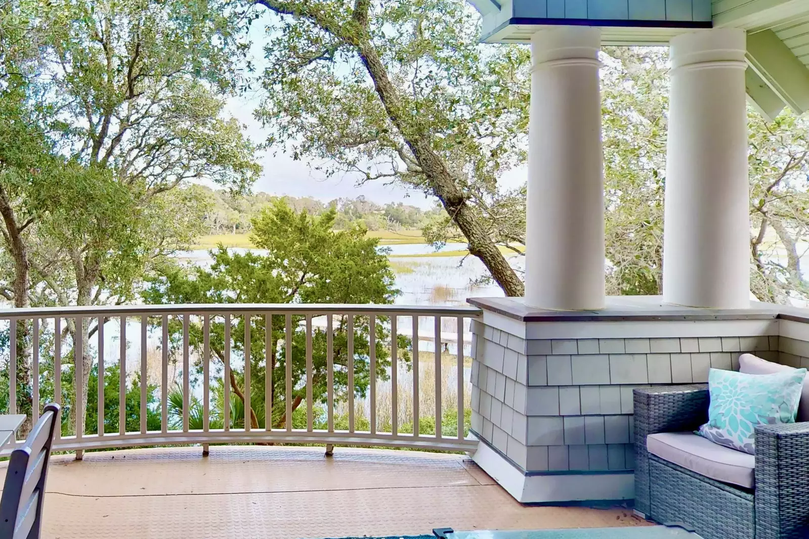 Drink your coffee, read a book or take a nap on this large, covered deck