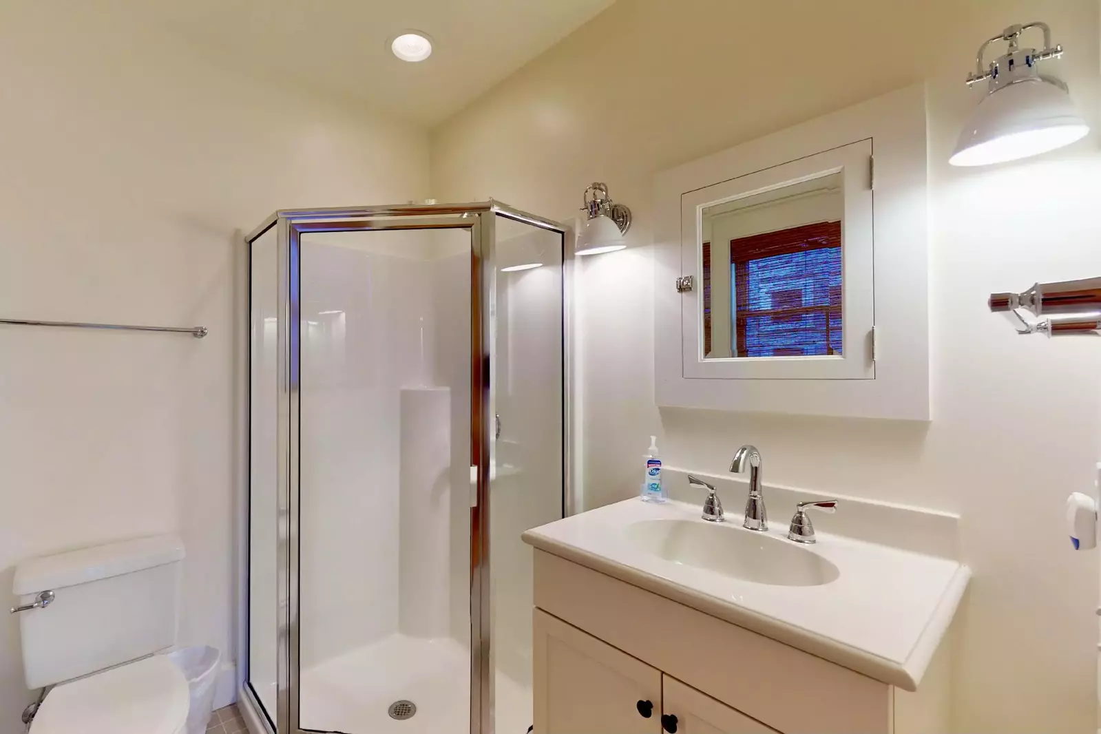 The downstairs king bedroom has a walk-in shower in the ensuite bathroom