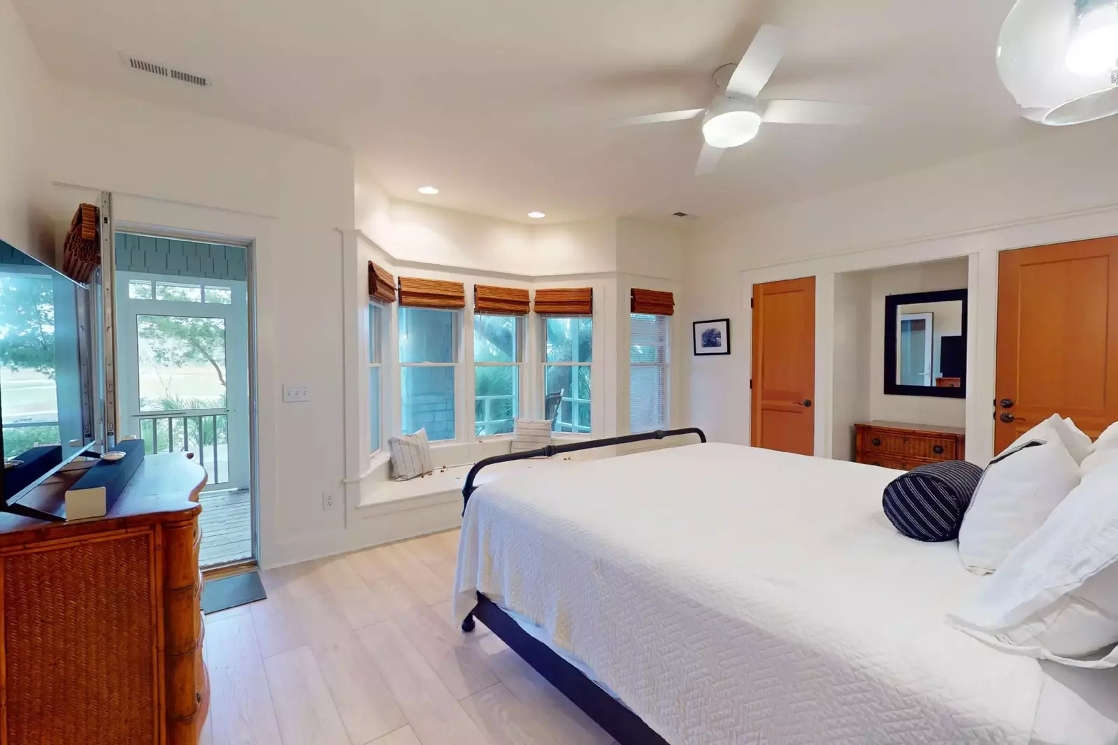 You'll have direct access to the screened patio from this beautiful room