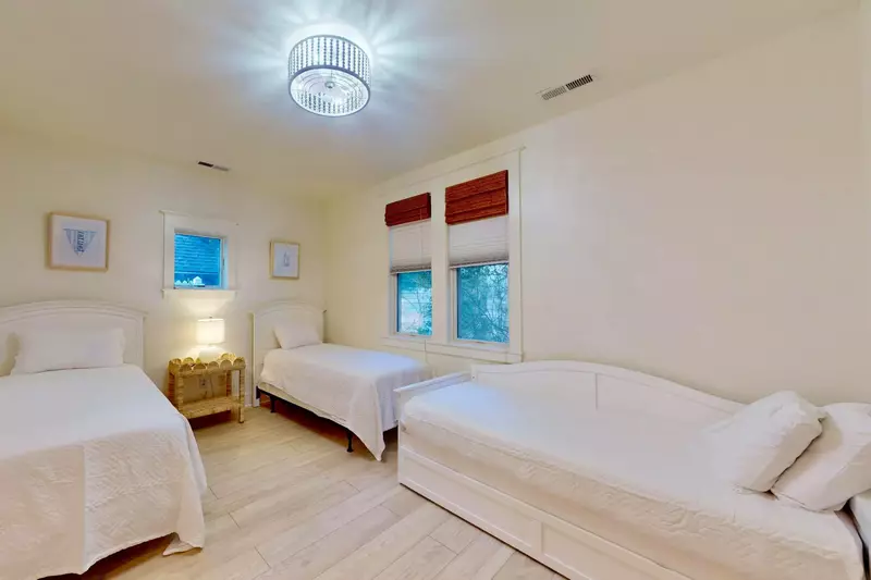 The twin bedroom has two twin beds, plus a twin daybed with an additional twin pull-out