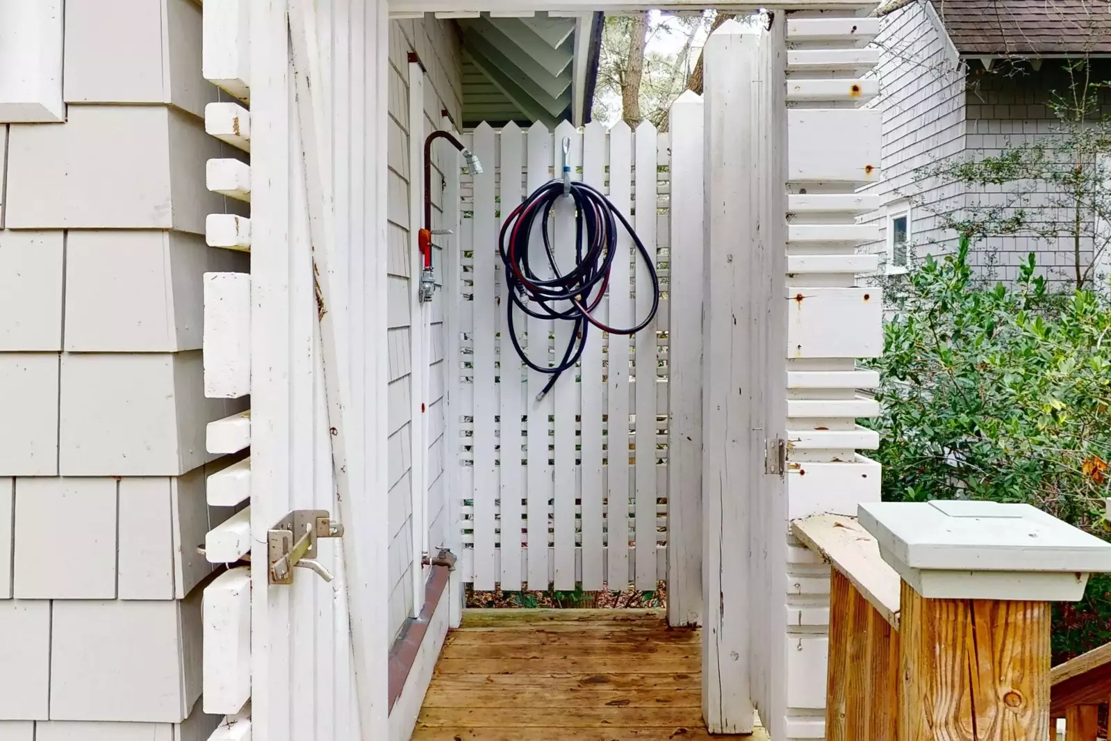 Wash off after a day at the beach in the outdoor shower