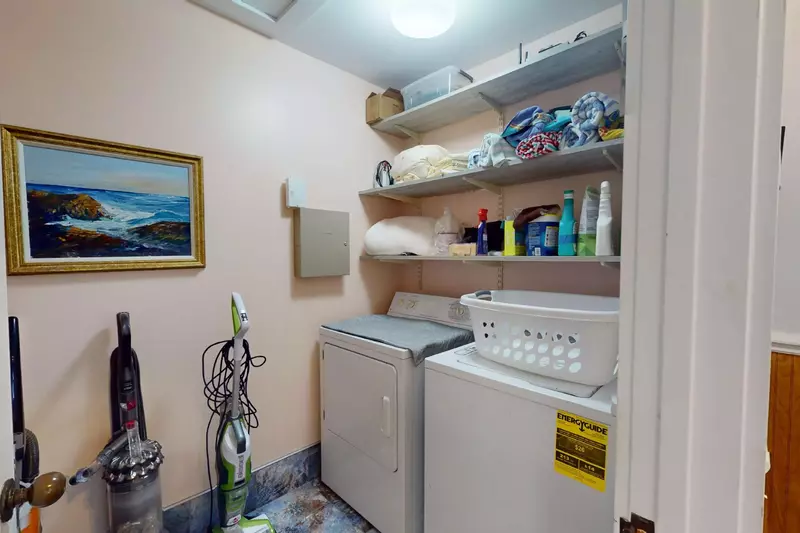 A laundry room is located upstairs