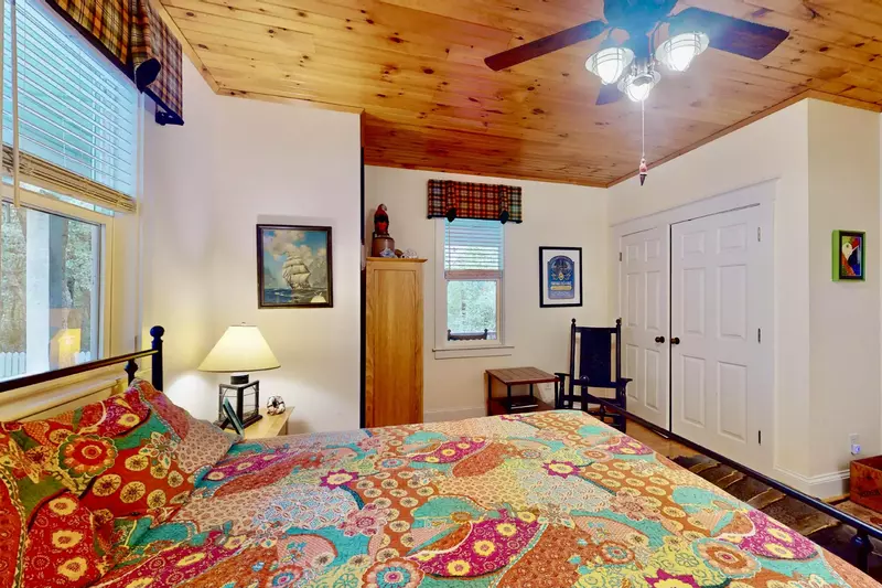 This bedroom also has a sitting area for relaxing