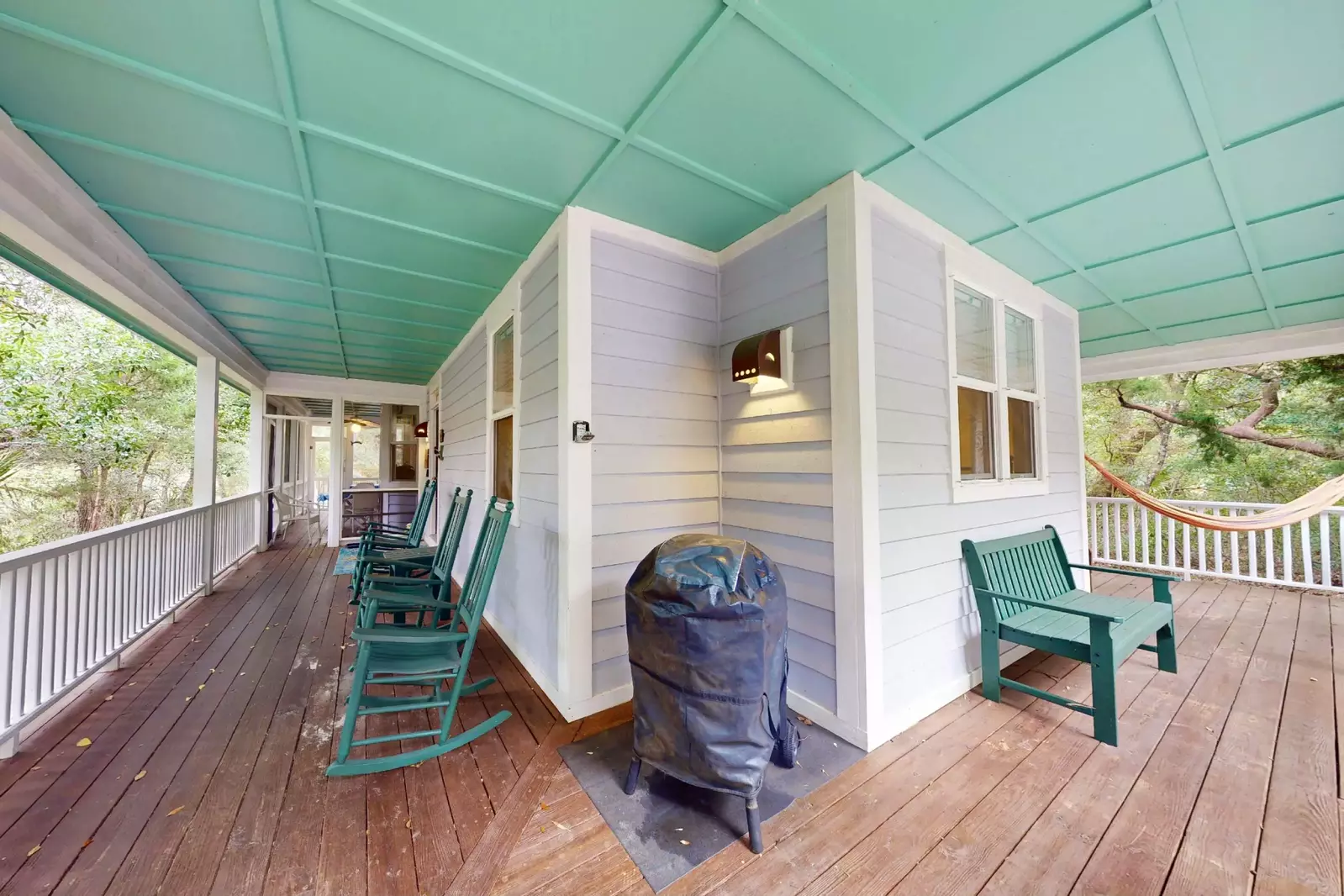 You can choose to rock, sit or enjoy the hammock on this large porch