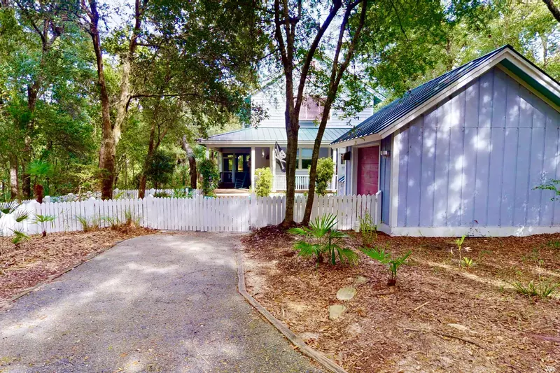 This secluded pet friendly home includes a fenced yard for your furry friends!