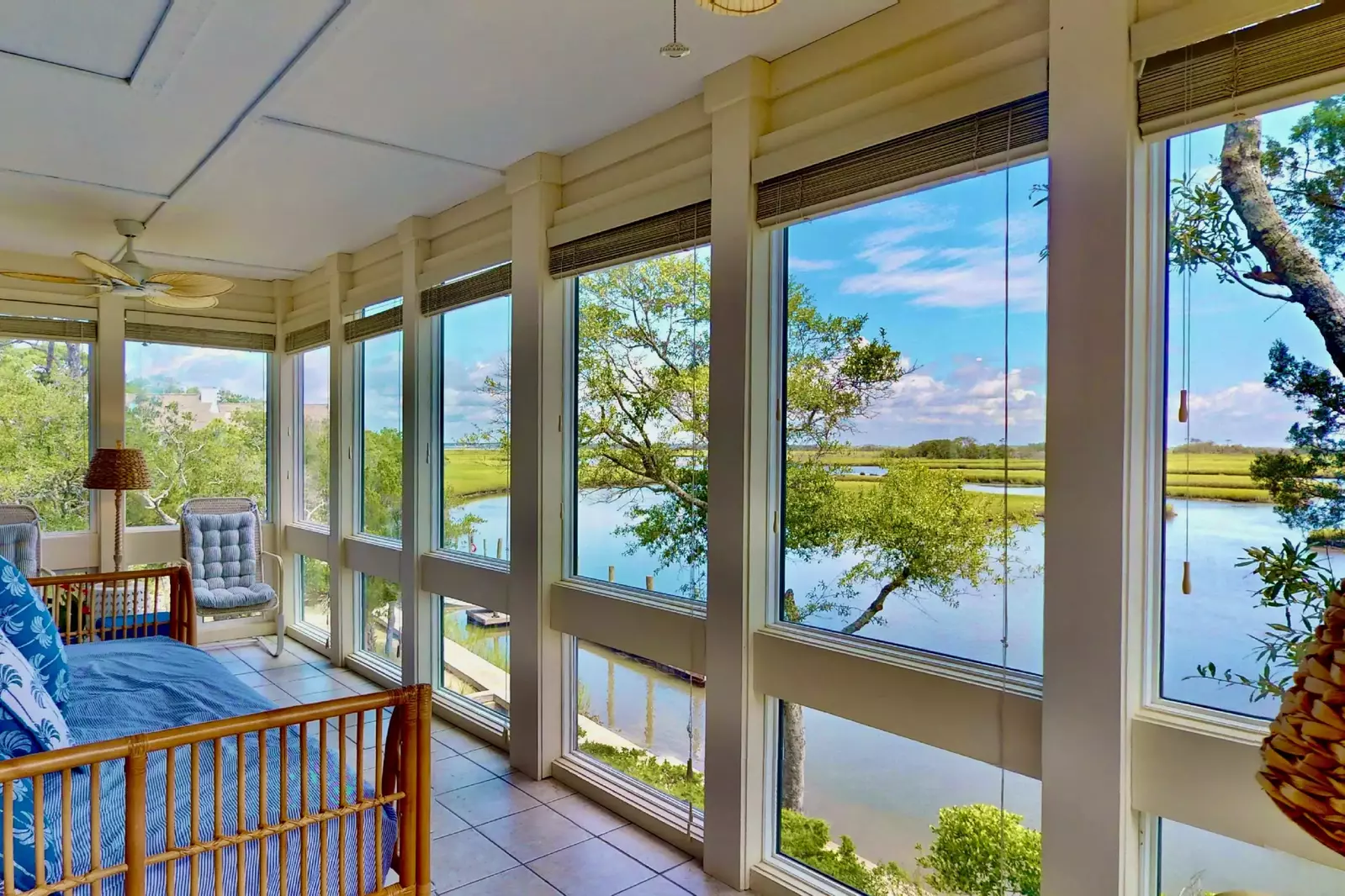 An air conditioned four seasons room overlooking BHI Creek provides all the amazing views without the heat and bugs!