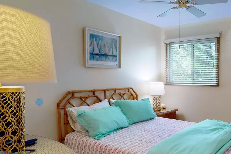 The 2nd bedroom has a queen bed and shares the hallway full bathroom