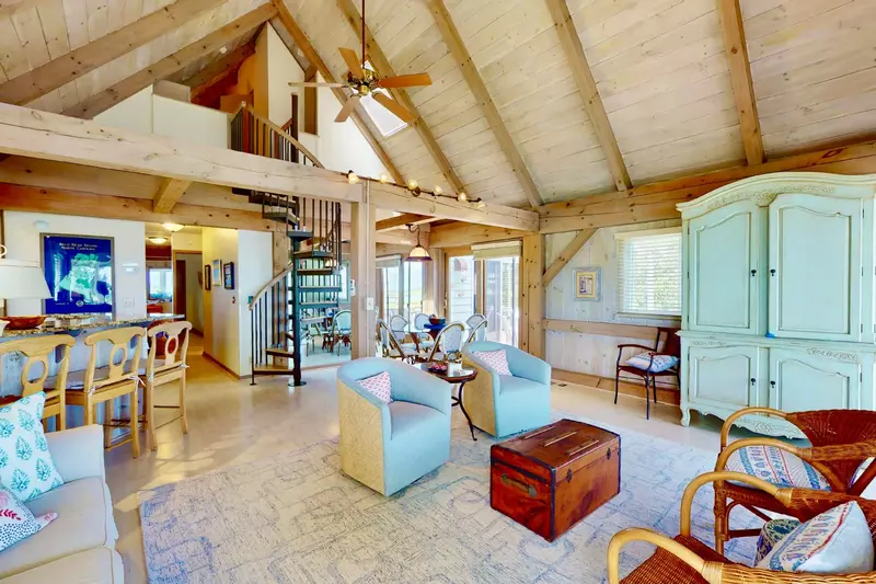 A beautiful spiral staircase leads to the loft