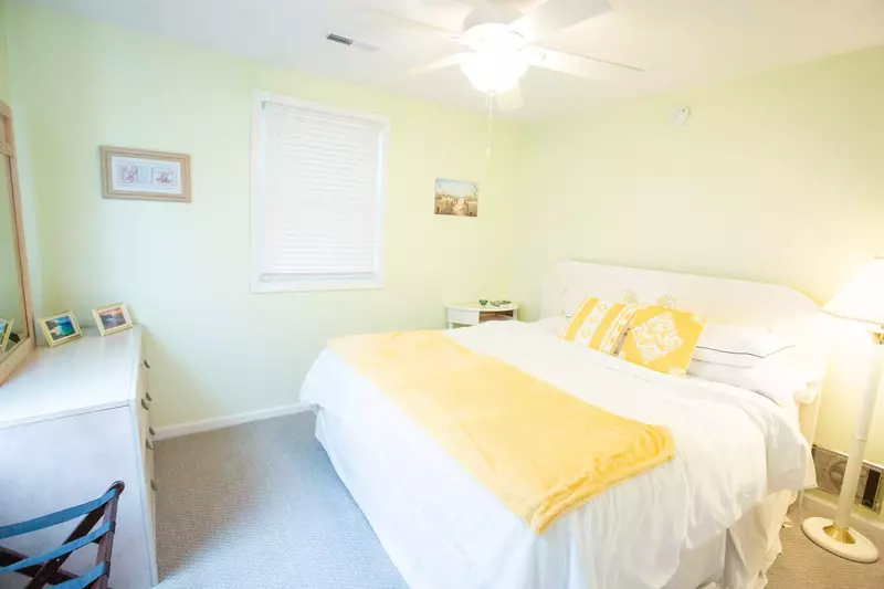 The main bedroom has a king bed