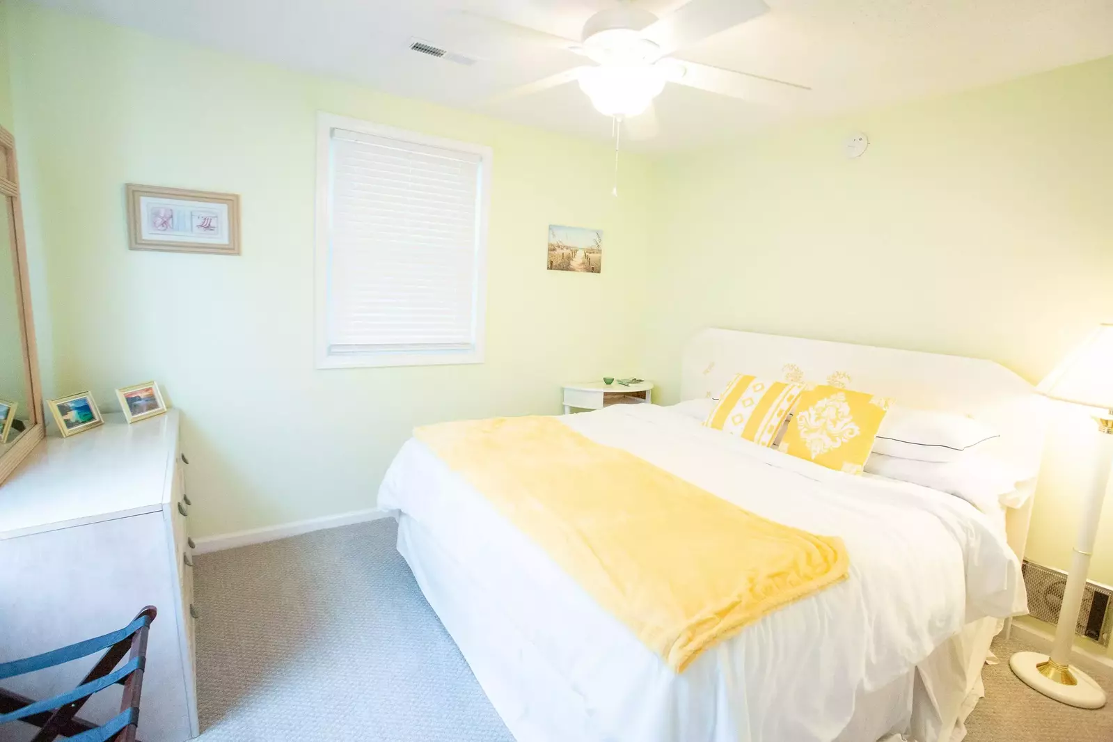 The main bedroom has a king bed