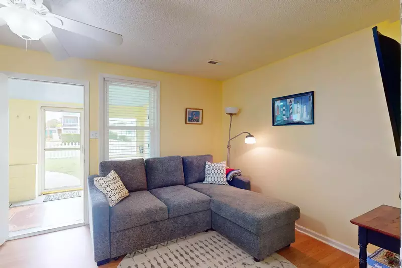 Lounge after a long day at the beach in this main living area