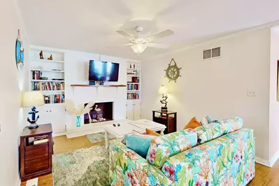 Relax in this cozy living room with a good book or catching your favorite show