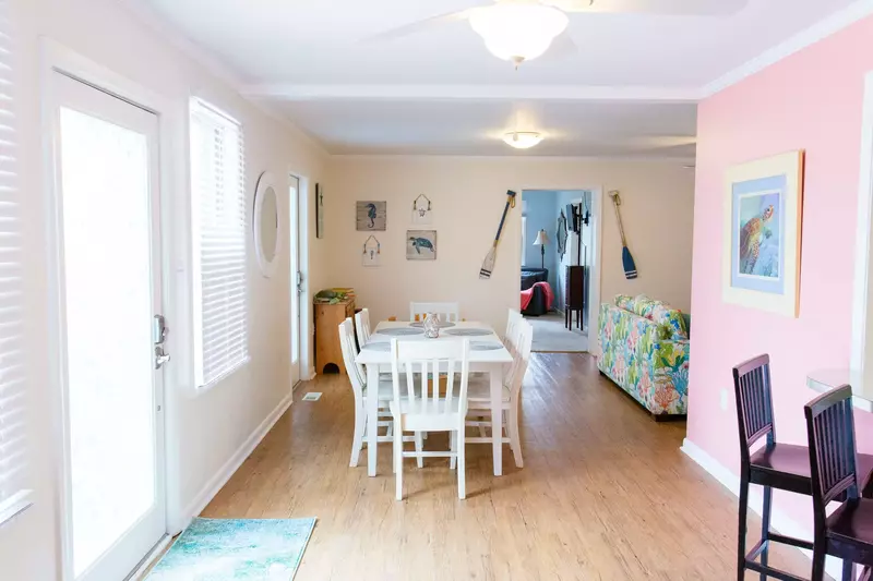 The dining area opens into the living area, as well as, a kids area