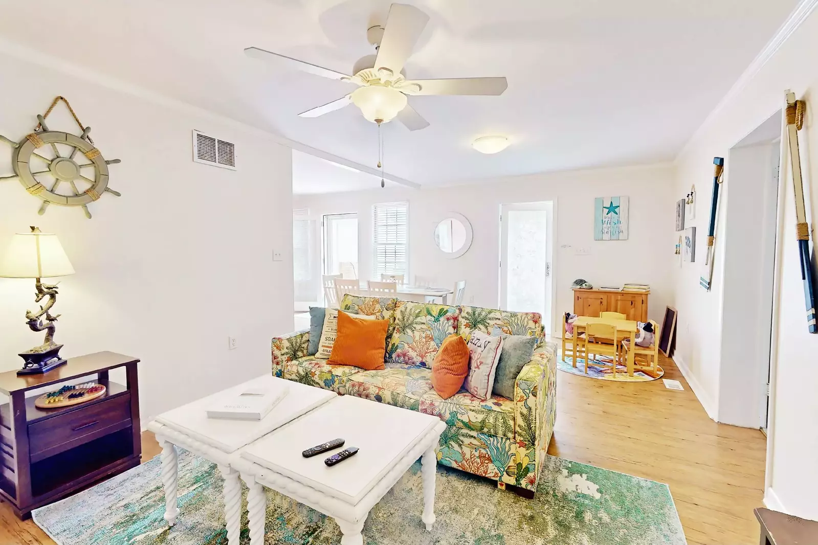 The living room opens into the dining area