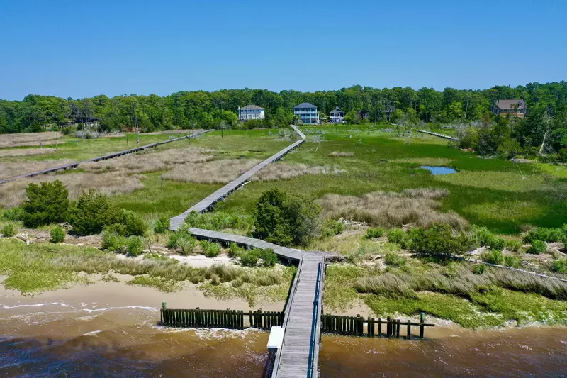 Enjoy a stroll out to the dock - Please note: Sandy beach area is only during low tide.