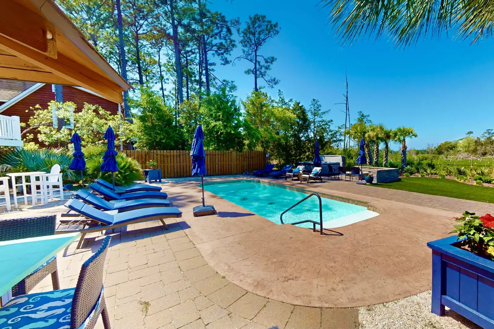 Relax by the pool with a book, a drink or some tunes