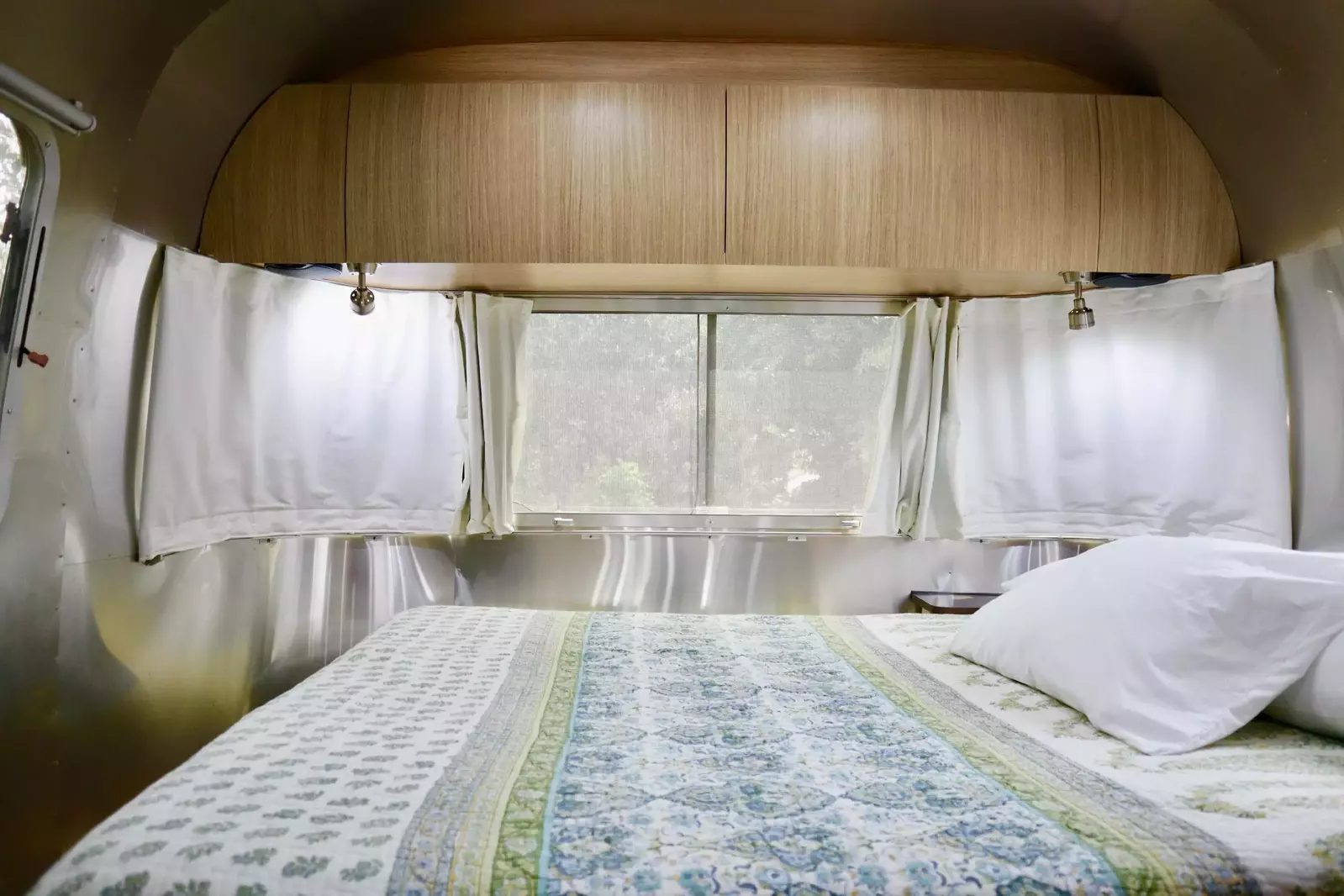 The Airstream add on features a queen RV bed