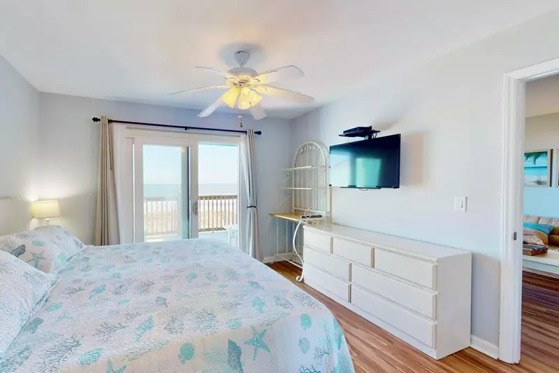 Master features an ocean view and wall mounted tv