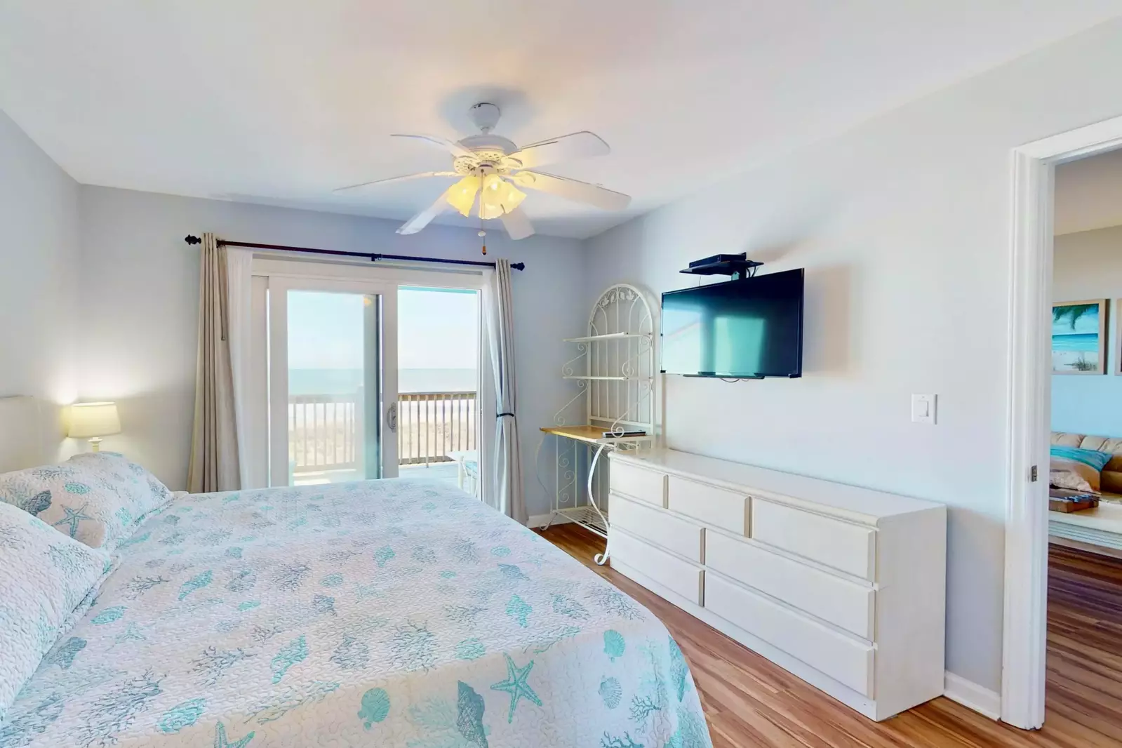 Master features an ocean view and wall mounted tv