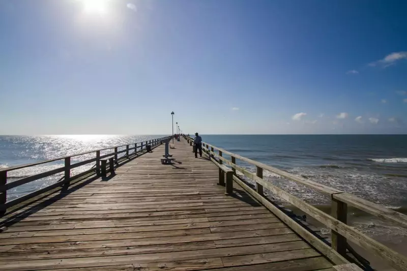 View beyond the horizons off the pier on the beach!
