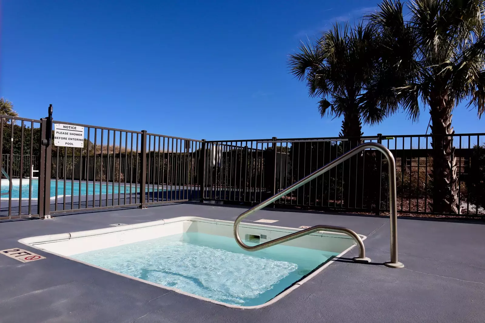 Building features a separate kiddie pool next to the ocean