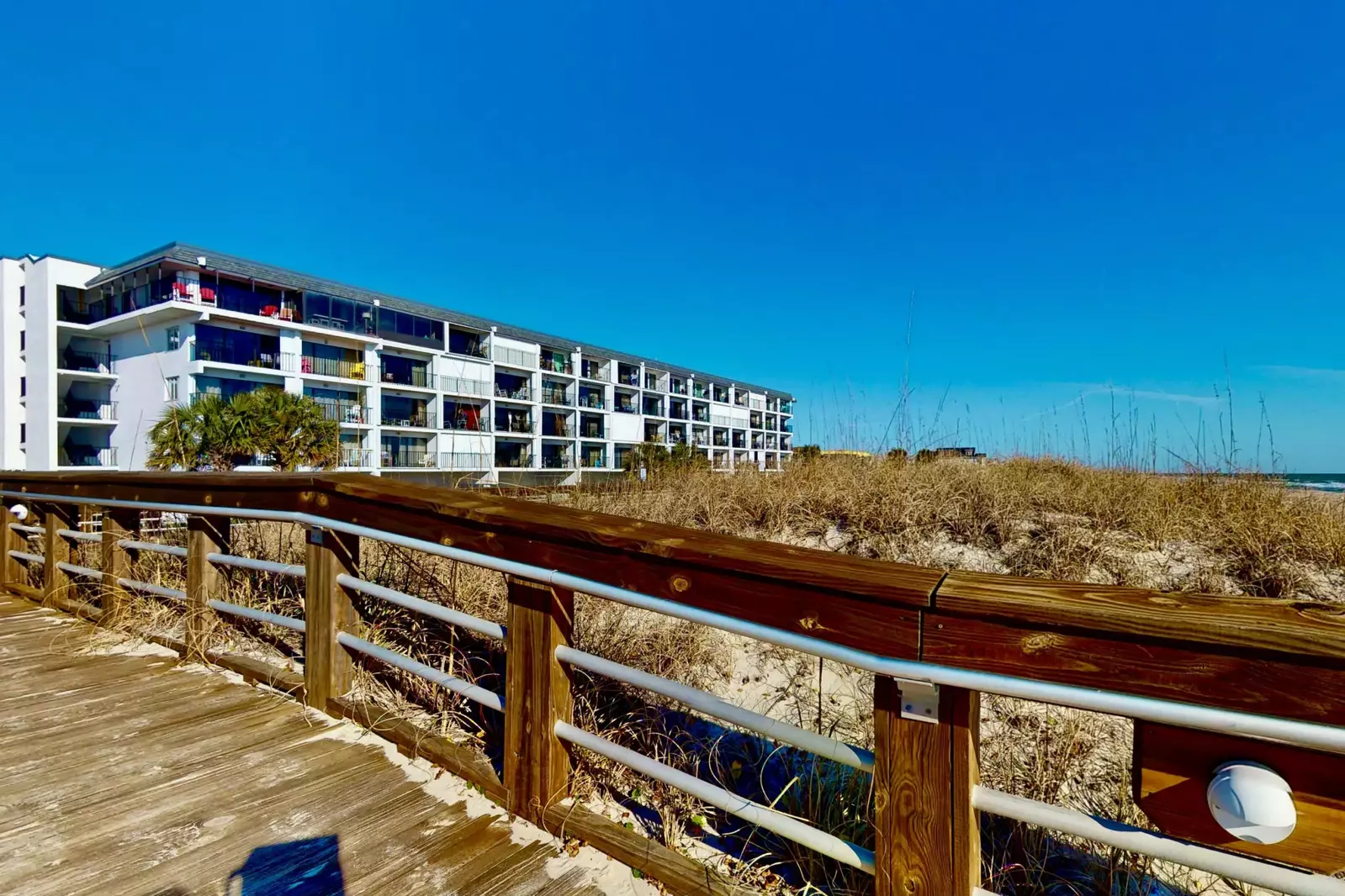 Beach access steps from the building