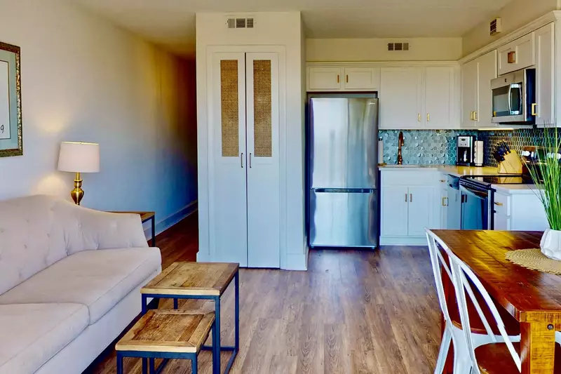 New custom doors reveal an in unit washer and dryer