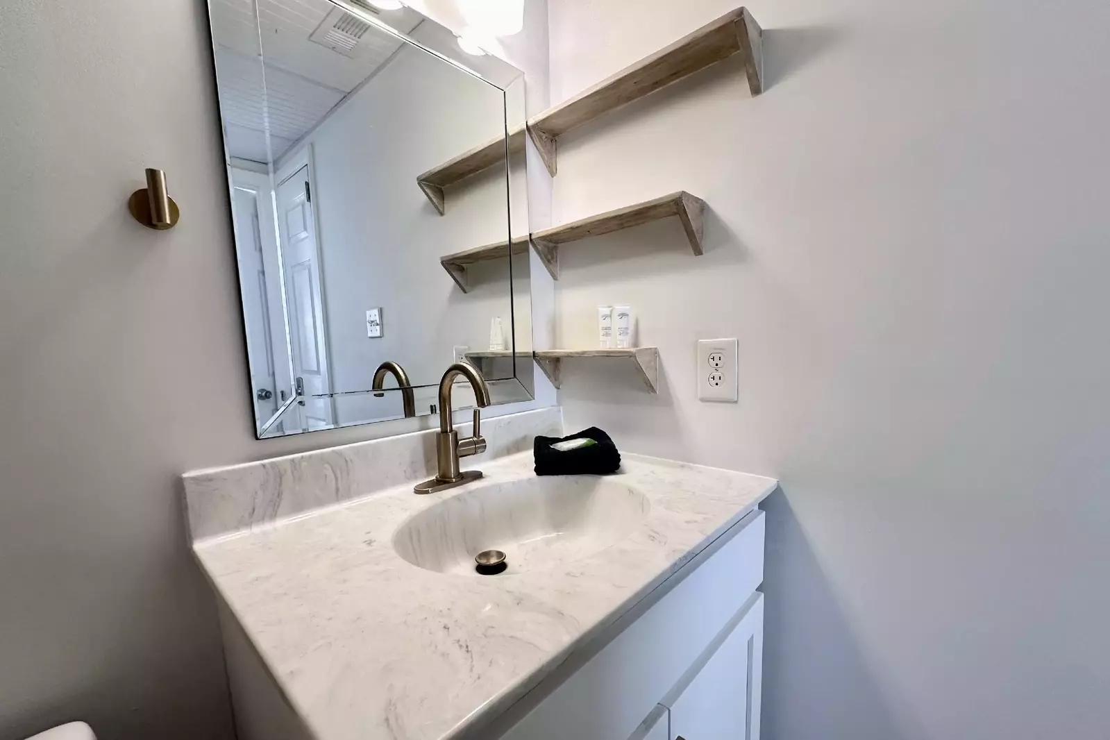 Master bathroom with plenty of shelving for your toiletries