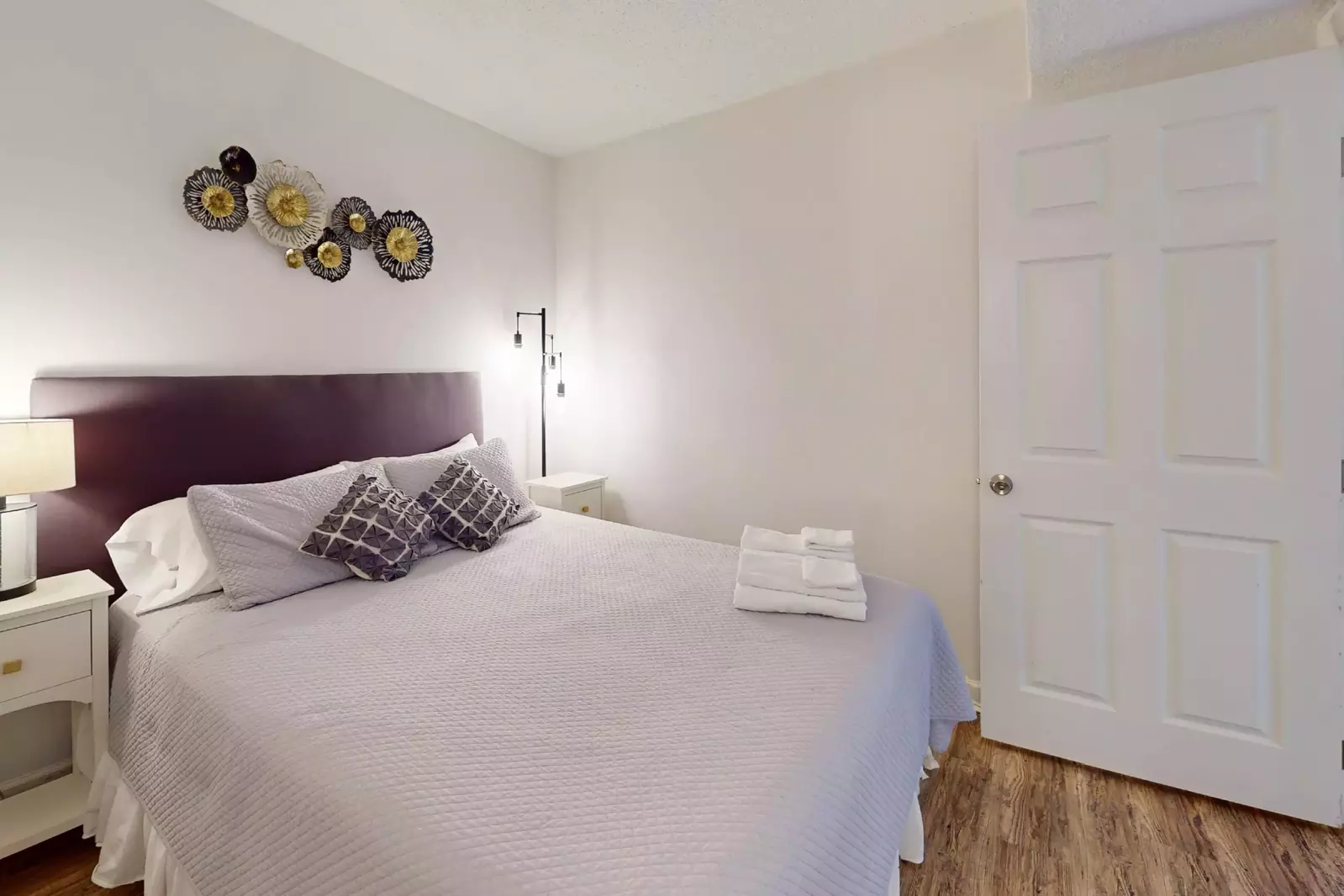 Second bedroom features a queen bed and private bathroom