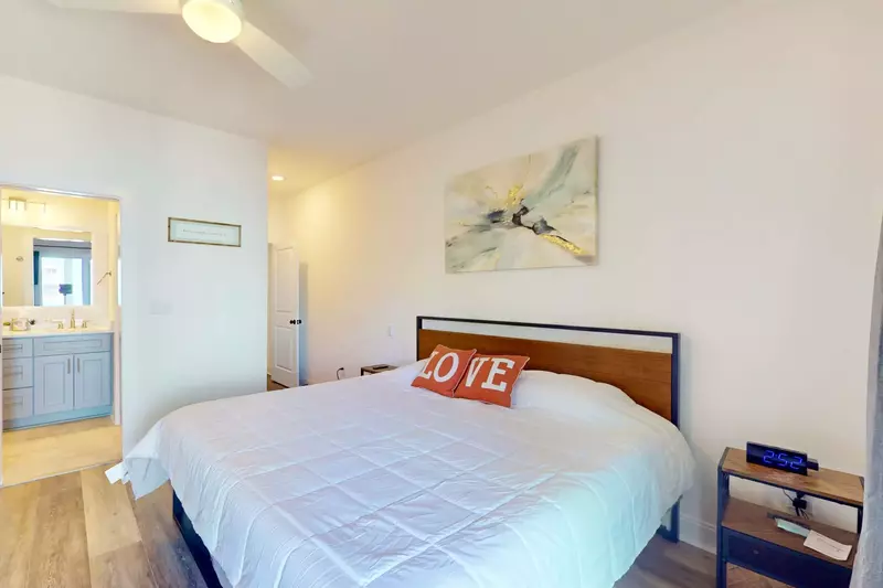 The owner suite features a king bed, en-suite bathroom with walk-in shower and private balcony!