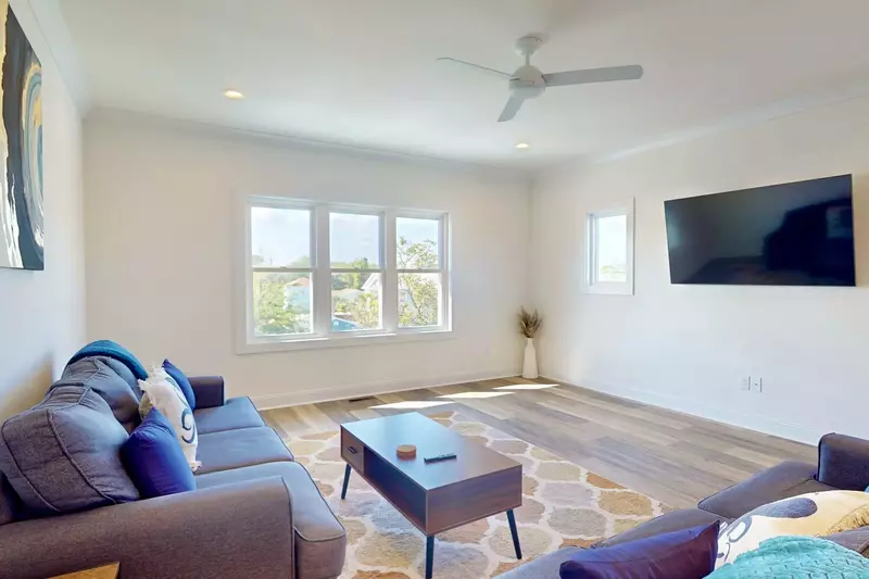 Main living area has a smart tv and plenty of seating