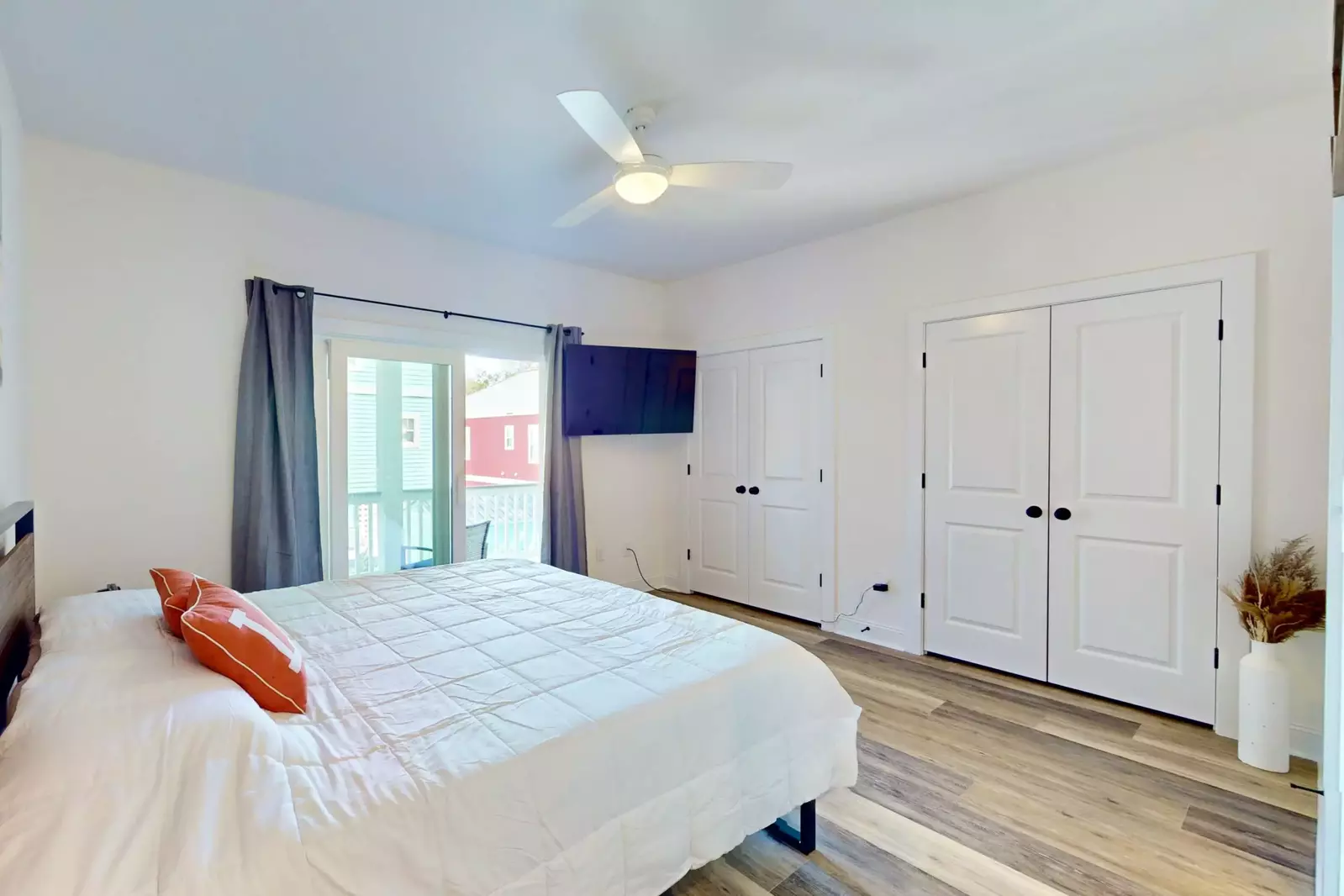 Blackout curtains and plenty of closet space are additional features in this master suite.