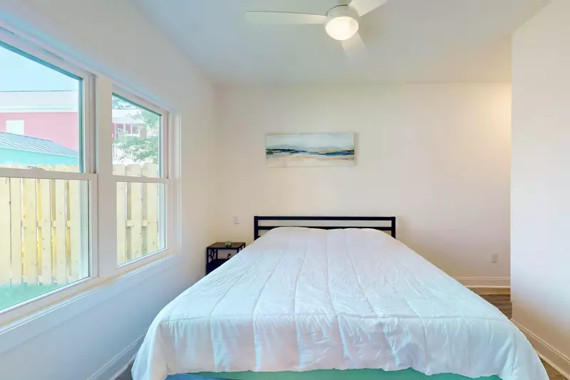 Bedroom #3 has a queen bed and shares a jack and jill bathroom with Bedroom #4