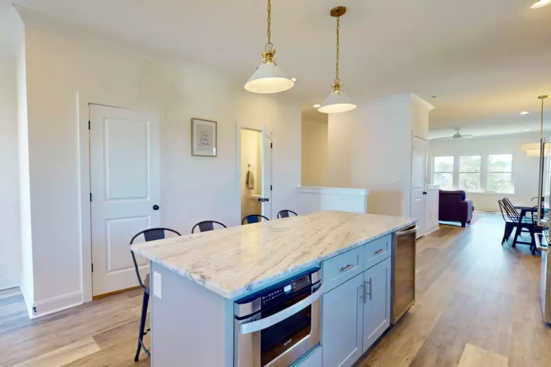 Half bathroom convenient to living, dining and kitchen